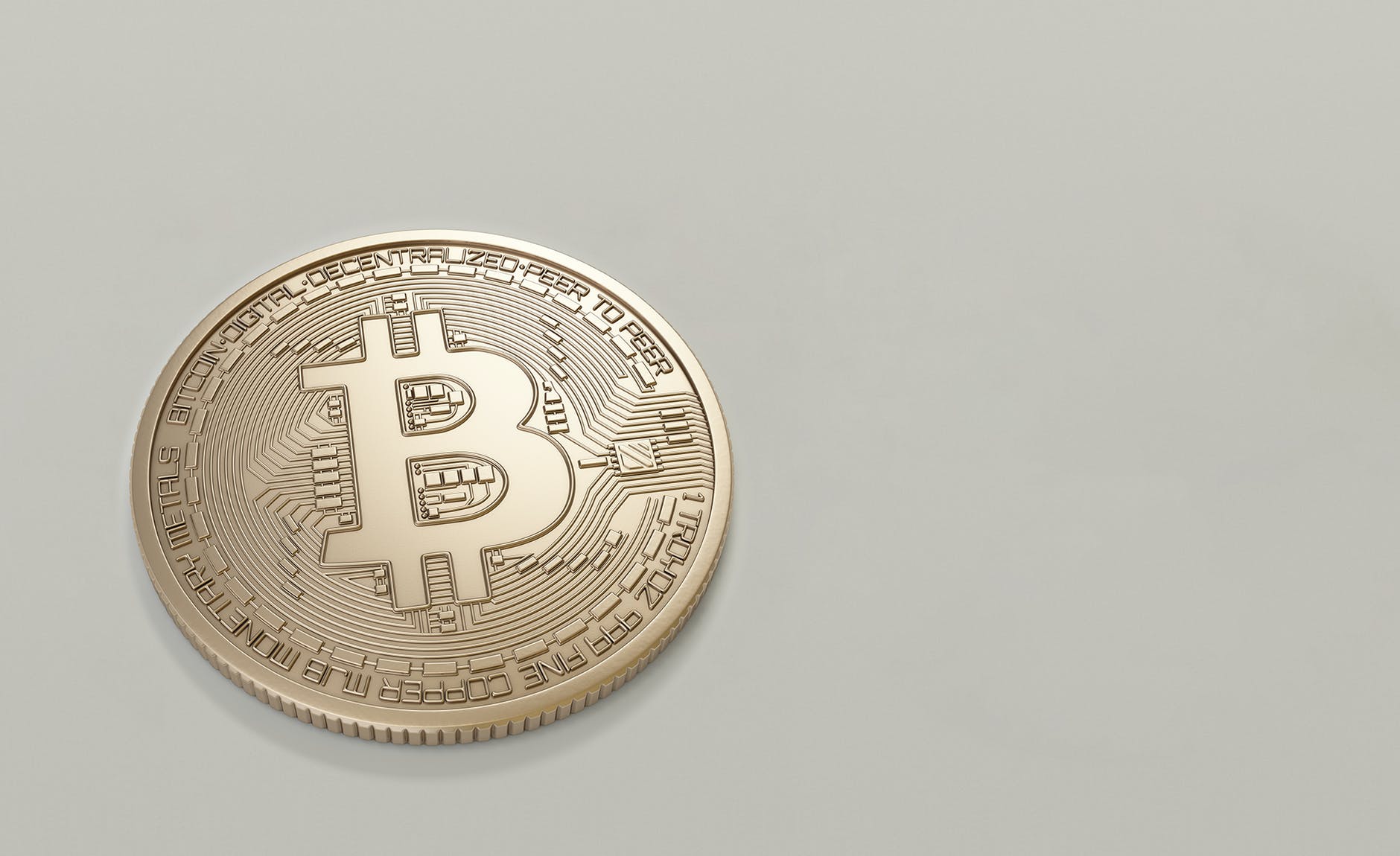round gold colored bitcoin